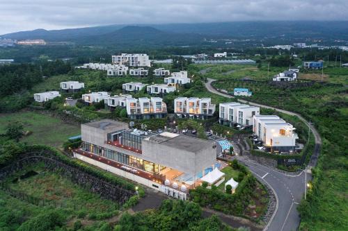 Seogwipo City Resort | Experience Velum Resort: Family-Friendly with Pool & Breakfast