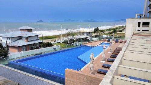 Itacolomi Apartment | Oceanfront Retreat at Venice Home Club - Balneário Piçarras
