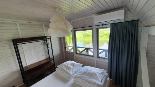 Kurzeme House | Ventas: Cozy Retreat with Pet-Friendly & Family Amenities