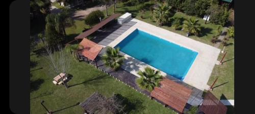 Concepcion del Uruguay House | Explore Verde y Sol: Family-Friendly Bungalows & Pool