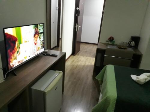 Camorim Hotel | Elegant Via Première Suite with City Views Near Riocentro