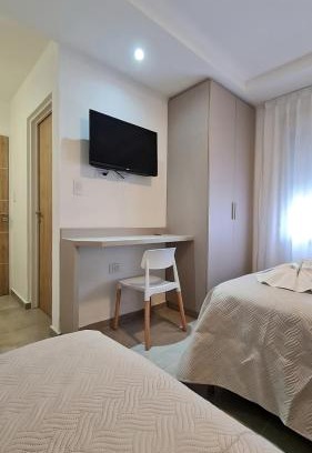 Villa Carlos Paz Hotel | Victor Hotel: Oceanfront Paradise with Pool & High Rating