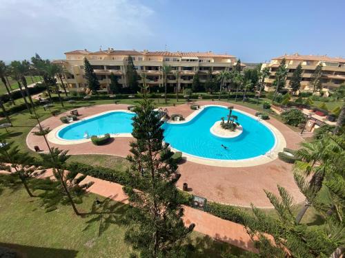 Roquetas de Mar Apartment | Victor Villa Romana: Oceanfront Oasis with Top Ratings