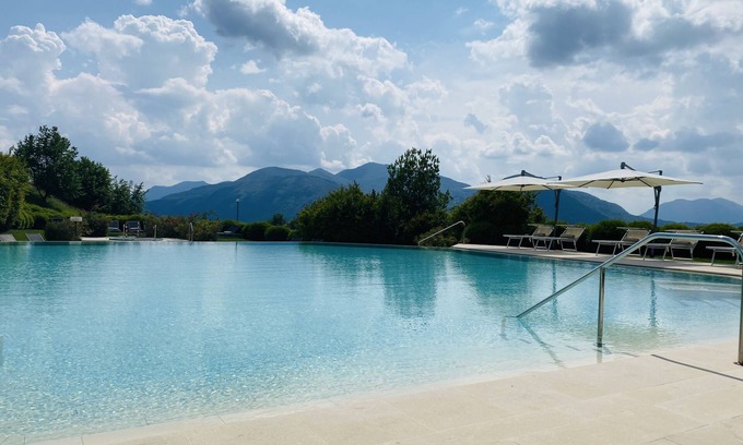 Agra Apartment | Elevated View Apartment at Five-Star Resort Collina d'Oro