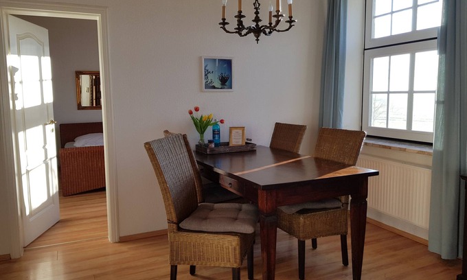 Fehmarn Apartment | View of the garden & fields, pets allowed