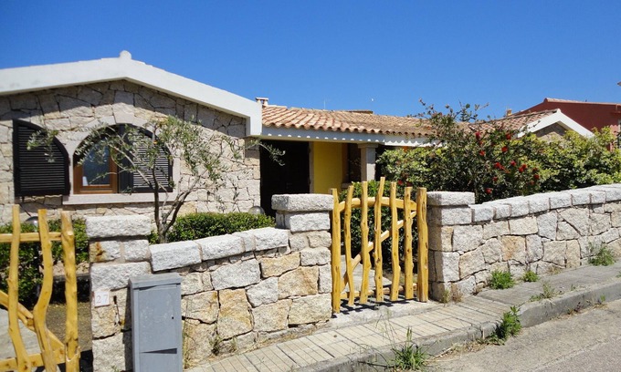 Vignola Mare House | Bay Vignola: Oceanfront Escape with Family-Friendly Amenities