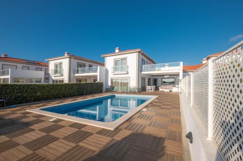Praia del Rei Villa | Discover Vila do Golfe Villa: Oceanfront Retreat with Spa