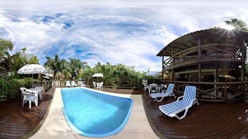 Praia do Rosa Hotel | Discover Vila dos Coqueiros: Pet-Friendly with Pool & Breakfast