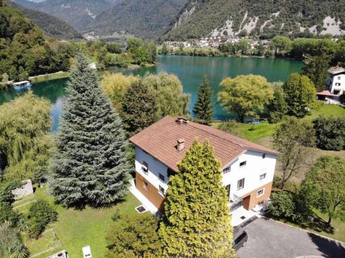Most na Soci Apartment | Vila Labod: Unique Lakefront Villa for Unforgettable Stays