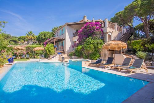 La Nartelle Villa | Cozy Villa Steps from the Beach with Pool & Hot Tub