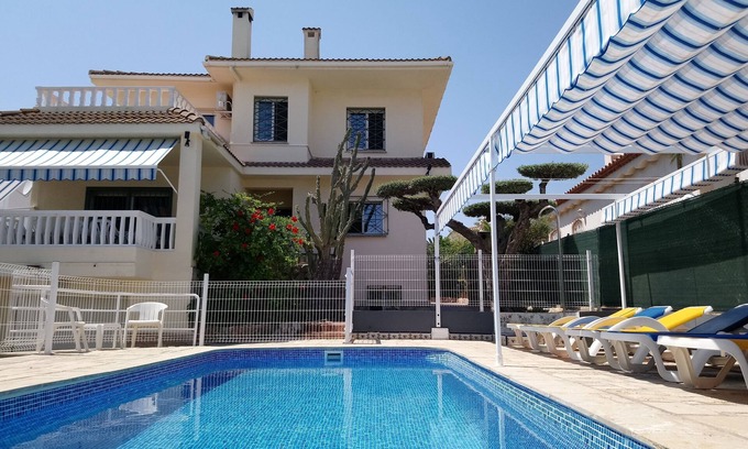L'Ampolla Villa | Elegant Villa Steps from Sandy Beach with Private Pool