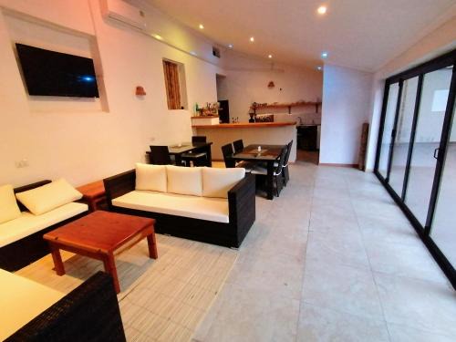 Blantyre Cabin | Villa 33: Family-Friendly Getaway with Pool and Spa