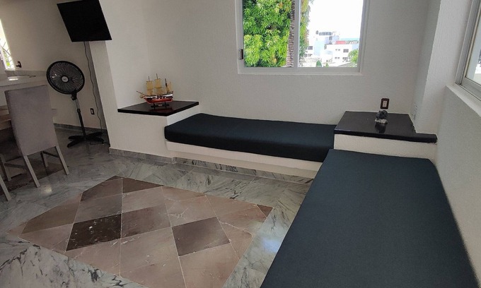 Lomas de Costa Azul Resort | Cozy Villa Steps from the Sea with Parking and Spa Amenities