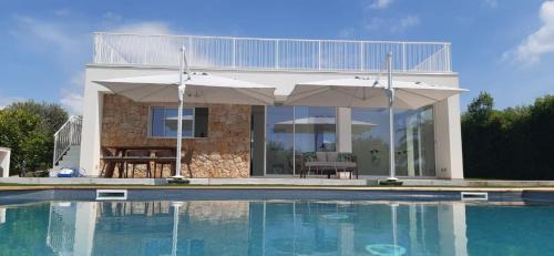 Alghero Villa | Villa 60: Guest Rated 10/10 with Oceanfront Pool Access