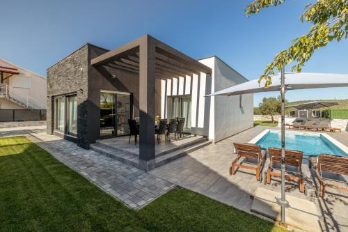 Bilice Villa | Relax at Villa A: Oceanfront Bliss with Pool Access