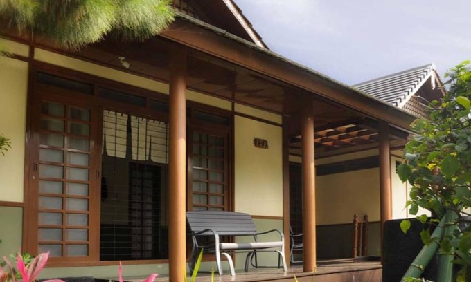 Cipanas Villa | Villa Ade: Inviting Stay with Kitchen and Breakfast Included