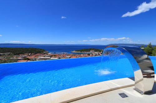 Moca Villa | Villa Afrodita: Oceanfront Retreat with Spa & Pool Access