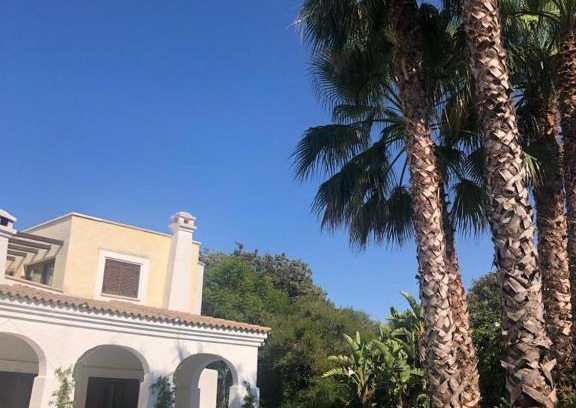 Trani House | Relax at Villa Amarilla with Poolside Amenities