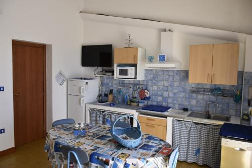 Cala Liberotto Apartment | Discover Villa Arancio Giorgio: Oceanfront Pet-Friendly Escape
