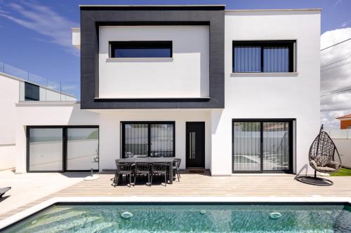 Atalaia Villa | Villa Atlantica One: Oceanfront Escape with Pool & 9.4 Rating