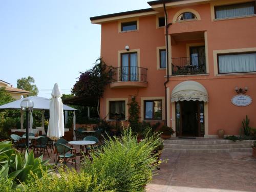 Le Castella Hotel | Villa Aurora: Oceanside Retreat with Hot Tub & Breakfast