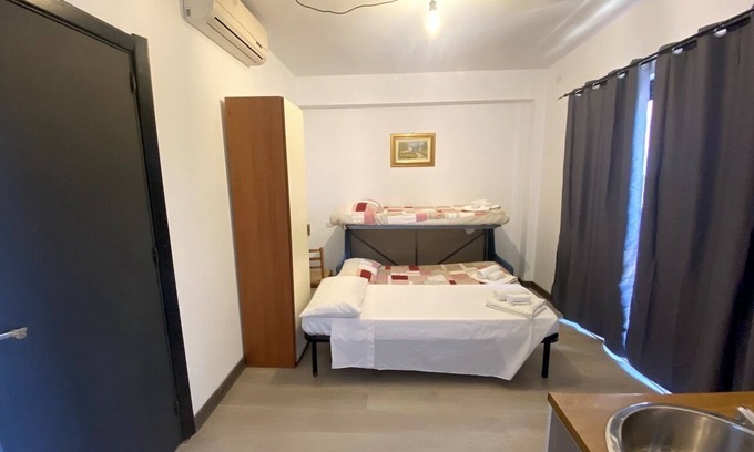 Assemini Apartment | Family-Friendly Villa Axes with Kitchen Amenities Await You