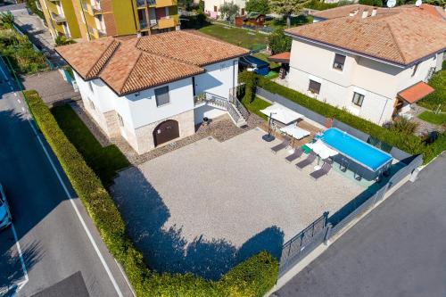 San Benedetto di Lugana House | Experience Villa Azdora: Oceanfront Bliss & 4-Star Comfort