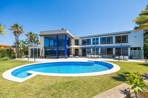 Badia Blava Villa | Discover Villa Bay Blue: Family-Friendly Retreat with Pool