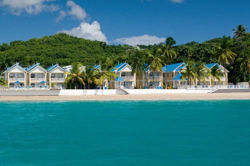 Choc Resort | Villa Beach Cottages: Oceanfront Getaway with Pool & Hot Tub