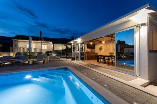 Plano Villa | Villa Bepo: Guest Rated 10/10 with Pool & Family Amenities