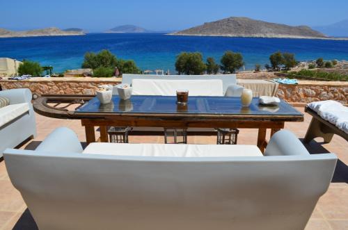 Halki House | Experience Villa Blu: Oceanfront Retreat with Private Beach
