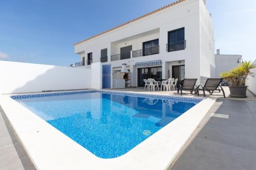 Vila Nova De Cacela House | Discover Villa Buganvilia: Family-Friendly with Pool!