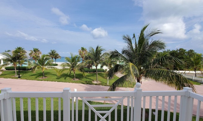 Alice Town House | Villa by the Sea: Oceanfront Retreat with Pet-Friendly Amenities