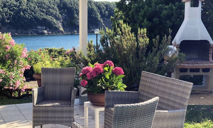 Bagnaia Apartment | Villa Cacciò: Seaside Retreat with Private Garden Oasis