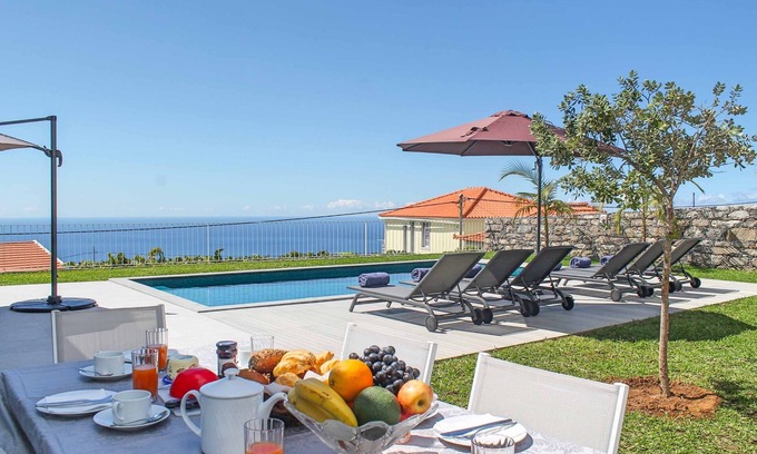 Estreito da Calheta Villa | Discover Villa Calheta Heights: Poolside Bliss Awaits