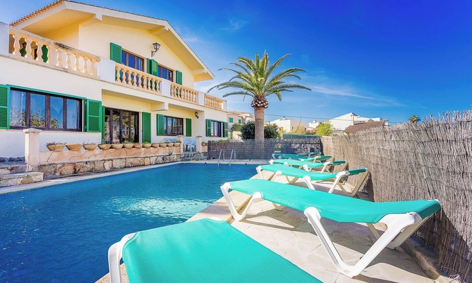 Portocolom Villa | Villa Can Sard: Poolside Oasis with Garden & Ocean Views