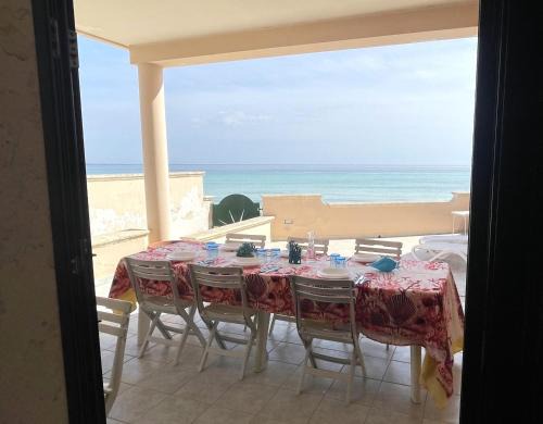 Torre Lapillo Villa | Beachfront Villa with Veranda and Pet-Friendly Amenities