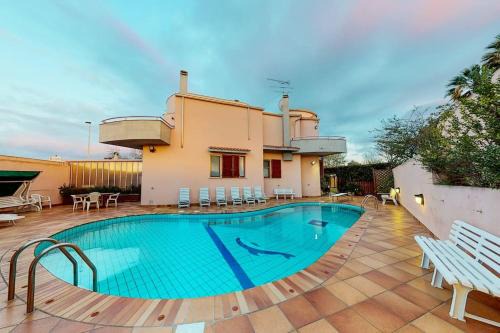 Quartu Sant'Elena Villa | Beautiful Villa with Pool and Garden Steps from the Sea
