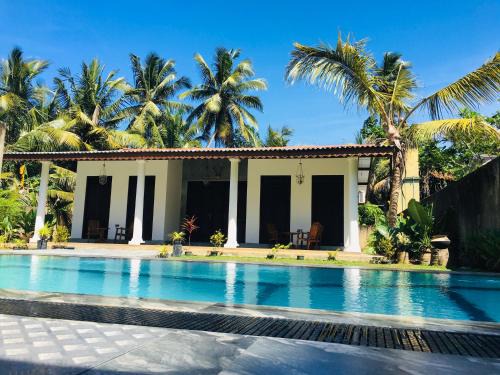 Thiranagama House | Discover Villa Conch by Om - Private House in Hikkaduwa