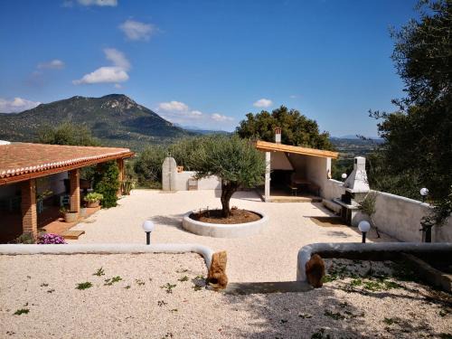 Oliena House | Villa Cusidore: Oceanfront Retreat with Family-Friendly Vibe