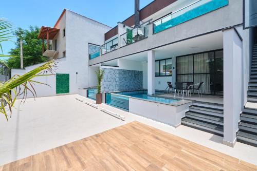 Ponte Branca Villa | Villa da Serra 2: Private Pools and Oceanfront Bliss