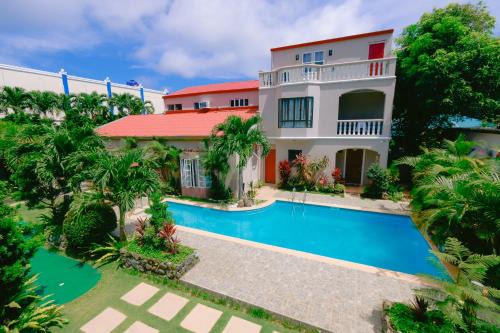 Basco Bed & Breakfast | Villa de Babat: Poolside Retreat with Top Guest Ratings