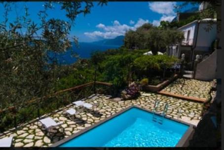 Laurito Villa | Villa De Rosa: Family-Friendly Retreat with Pool & Hot Tub