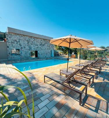 Lindoia Hotel | Experience Villa do Éden: Poolside Oceanfront Getaway