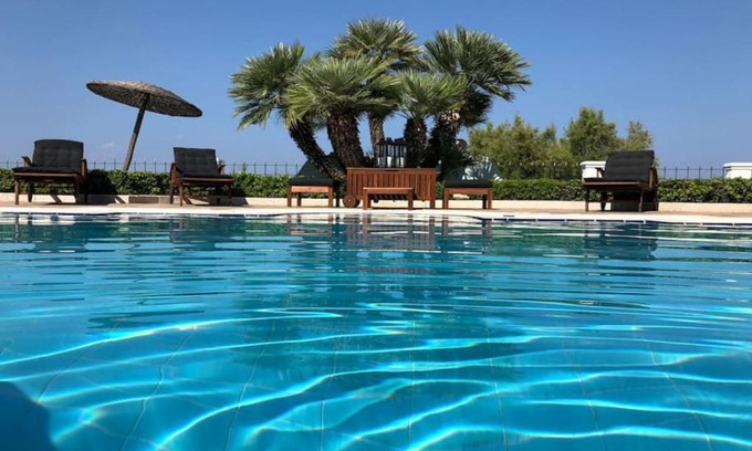 Egira Villa | Serene Villa Dolphin Akrata: Oceanfront Haven with Pool