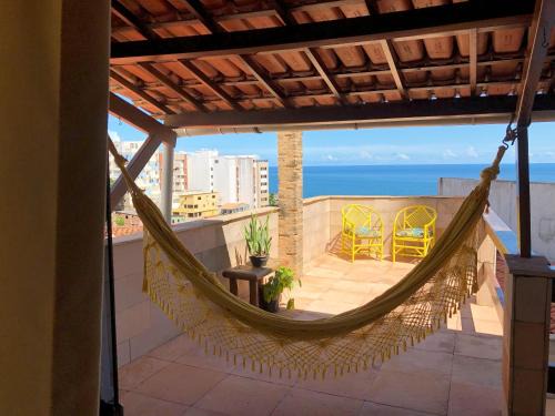 Rio Vermelho Apartment | Relax at Villa Domenico: Oceanfront Escape with Pool & Spa