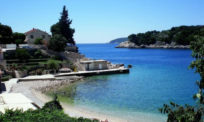 Stikovica Apartment | Oceanfront Villa Doris: Family-Friendly with Pet Perks