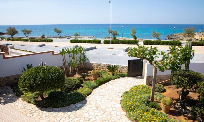 Capilungo Villa | Villa Eleonora: Poolside Retreat with Perfect 10 Rating