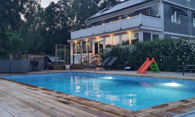 Bergsnas Villa | Discover Villa Elme: Oceanfront Bliss with Spa Amenities