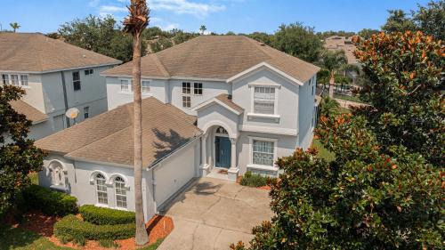 Haines City Villa | Elegant Villa Eman: 5-Bedroom Oasis with Pool & Hot Tub